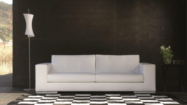 Divano componibile angolare con chaise longue e design moderno, fornito da Tino Mariani a Lissone in provincia di Monza e Brianza.