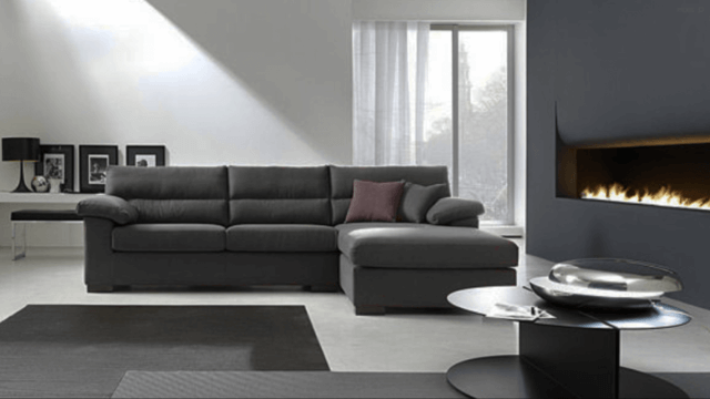 Divano moderno Nevada con chaise-longue in tessuto grigio scuro, design elegante e personalizzabile di Tino Mariani