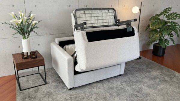 Apertura poltrona letto Oslo con materasso alto e porta guanciali Tino Mariani Lissone Monza Brianza