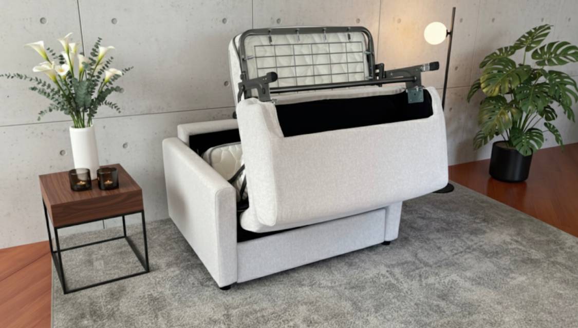 Apertura poltrona letto Oslo con materasso alto e porta guanciali Tino Mariani Lissone Monza Brianza