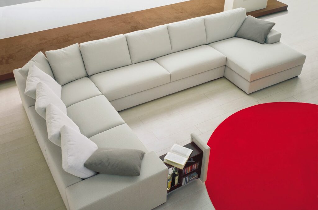 Divano angolare moderno di grande dimensioni modello Merit Tino Mariani, elegante e artigianale per salotto