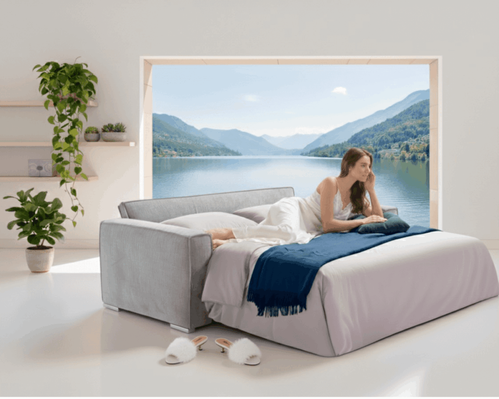 Divano Letto Marrakech Tino Mariani con ragazza sdraiata in relax, comfort e design Made in Italy