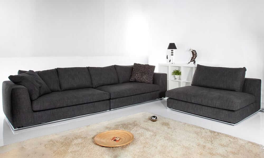 Divano angolare Oasi componibile con sedute ampie e design contemporaneo, disponibile da Tino Mariani a Lissone in provincia di Monza e Brianza.